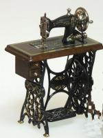 Walnut Treadle Sewing Machine